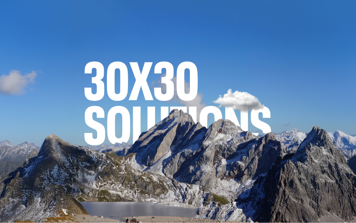 30x30 type graphic over mountains
