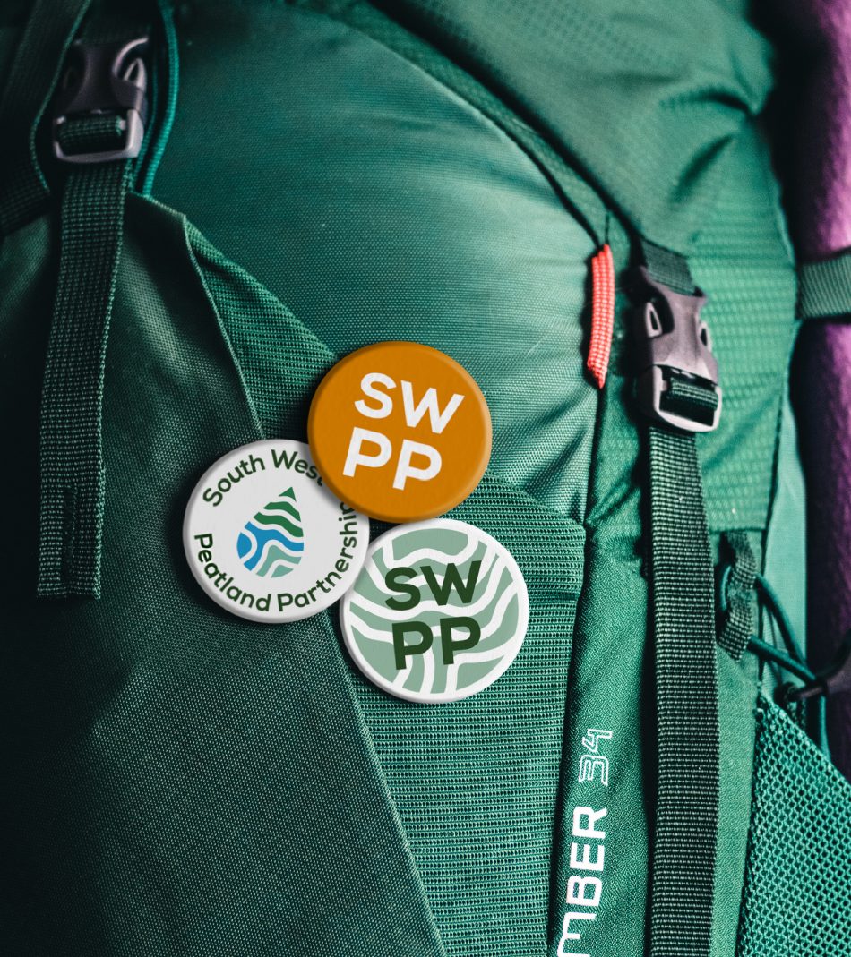 SW Peatlands Partnership badges on a backpack