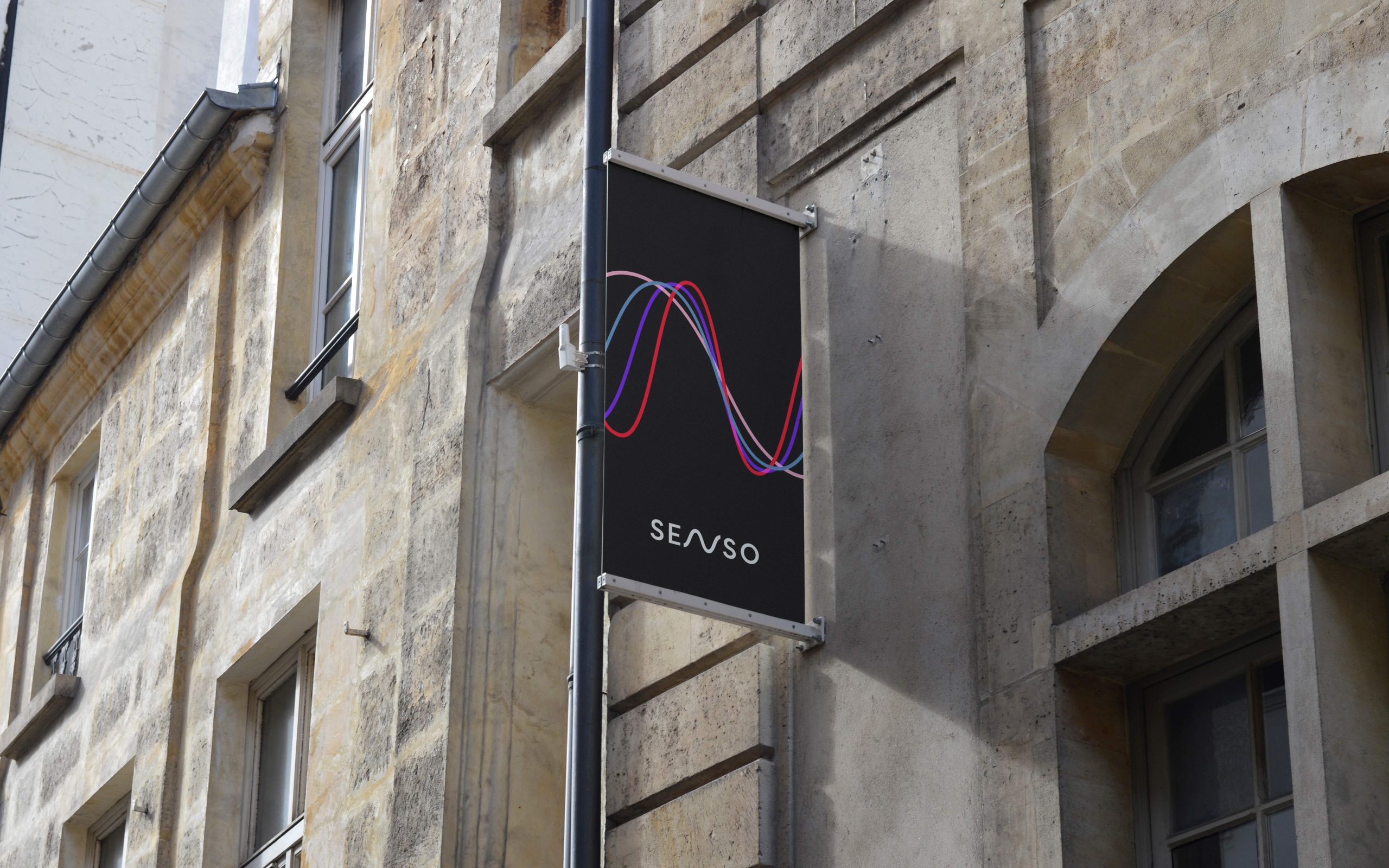 Senso Systems branding on a shop front banner