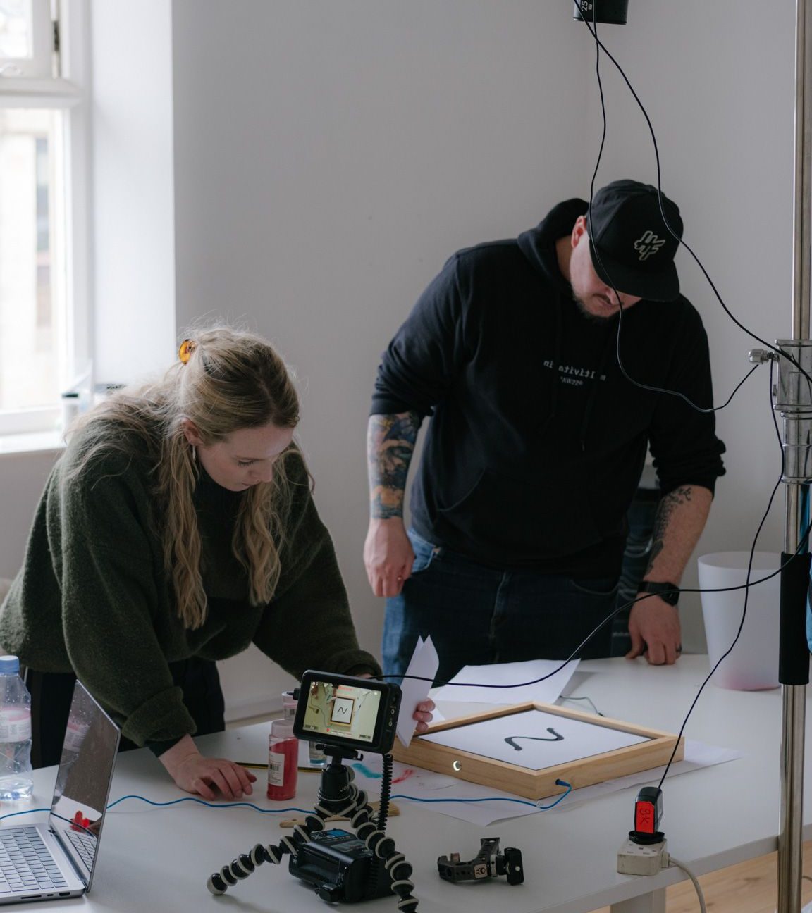 Georgia Griffiths and Sam Thomas experimenting with a Chaladni plate during the development of the Senso systems brand